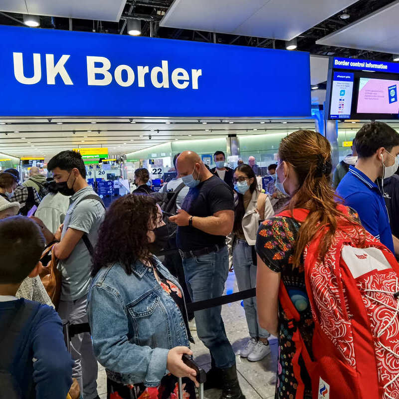 Passengers Queuing At The UK Border Control In London Heathrow Airport, London, England, United Kingdom
