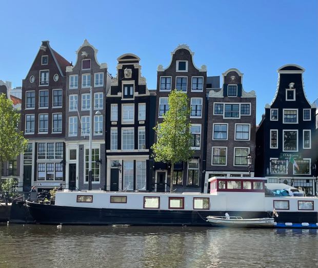 Dancing houses, pictured from a canal boat in Amsterdam.