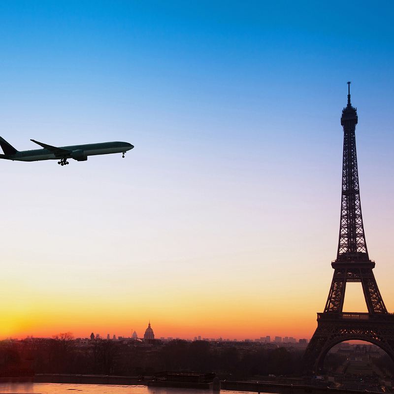 Aircraft Approaching Paris At Sunset