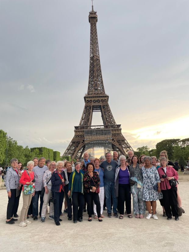 Our travel group beneath the Eiffel Tower in Paris